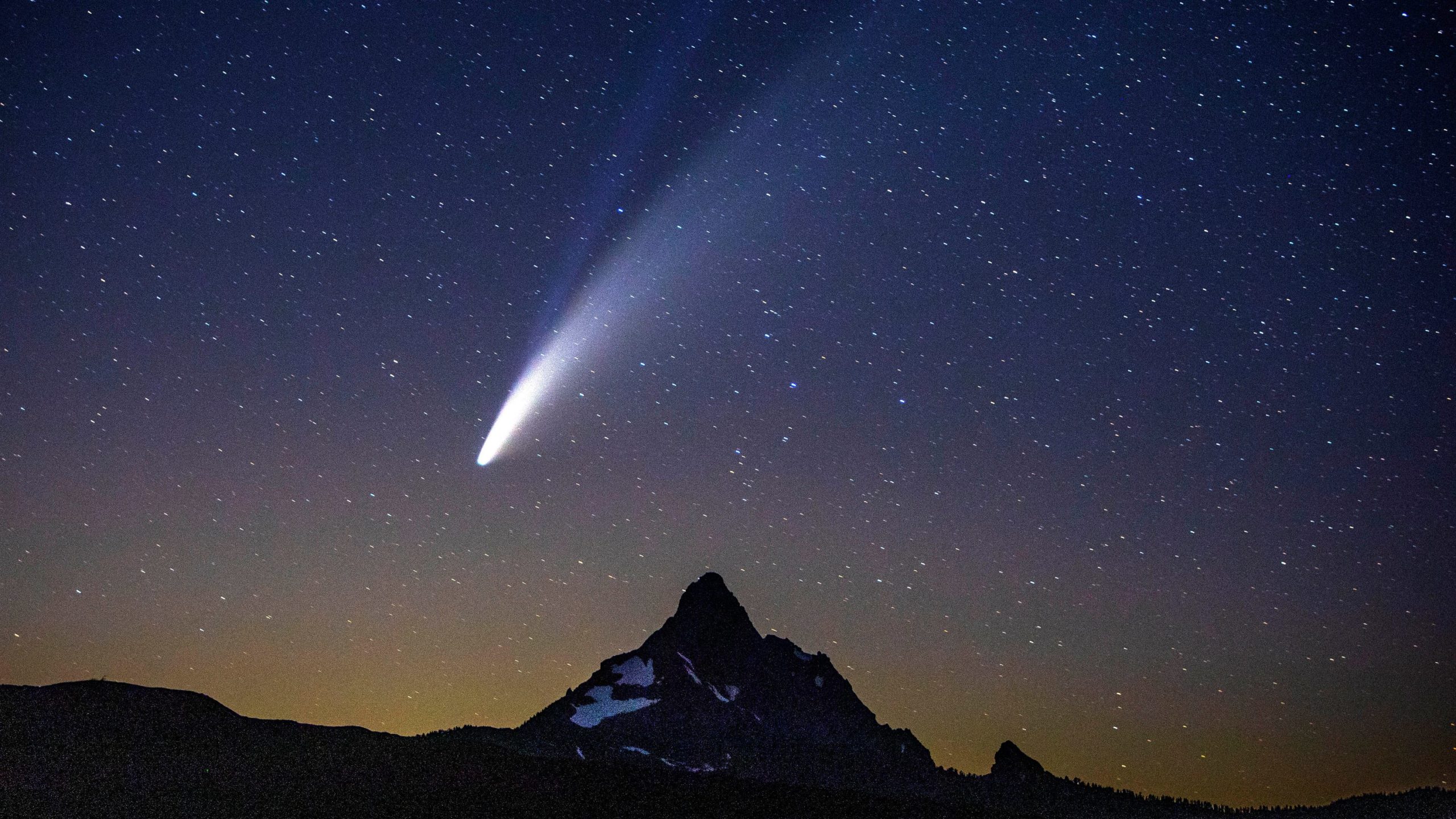 Mountain landscape, night sky, comet Neowise passing