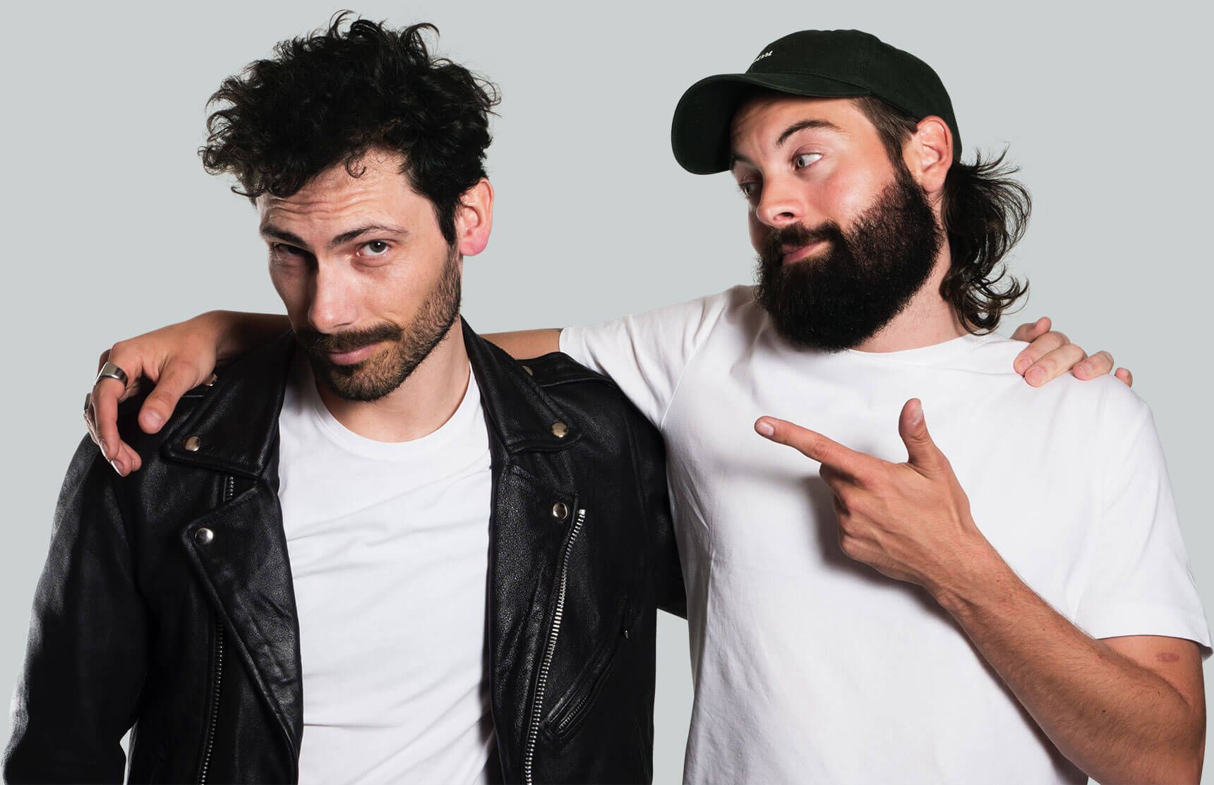 Two guys with trimmed beards and mustaches